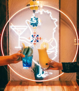 LED neon cocktail bar sign with a hedgehog and cocktail glass outline